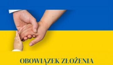 Pomocne dłonie, w tle flaga Ukrainy - powiększ